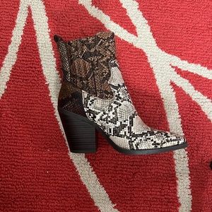 Snake skin like booties size 7.5 brand new never worn, 1 yr old made in China.